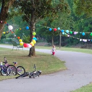 Balloon Bunting Party Decor Neighborhood Party Ideas, Parking Lot Party, Balloon Bunting, Halloween Block Party, Party At The Park, Summer Block Party, Balloon Fish, Neighborhood Block Party, Cookout Party