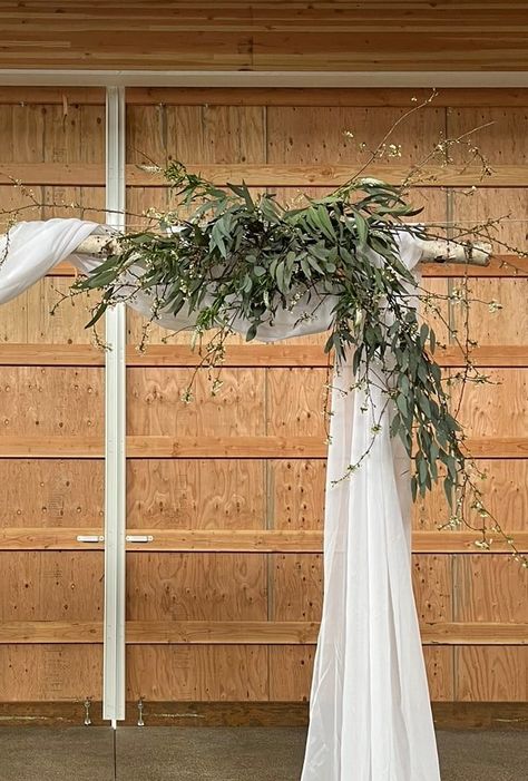 The diy spring wedding arbor is perfect for your outdoor ceremony. See how easy it is to make and how much money you’ll save!

Put your own personal spin on a traditional wedding arbor with this simple DIY! Decorated Arbor For Wedding, Simple Wedding Arbor Diy, Diy Wedding Arch Greenery, Fake Flower Arbor, Farm Wedding Arbor, Diy Arbour Flowers, Wedding Arbor Ideas Greenery, Wedding Arbour Greenery, Floral Arbour Wedding