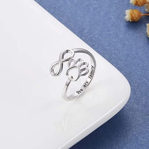 This 925 sterling silver adjustable Puppy Pet Lovers Paw Print Ring is the perfect gift for animal lovers! Its creative open-pierced design features a heart-shaped ring inset with a paw print, making it the ideal accessory to show off your love for both fashion and animals. This adjustable ring is perfect for pet-loving friends and families. About this item: You may have many best friends but your pet only has one. You wear this ring, and no matter where you go, he/she seems to be by your side. Puppy Paw Print, Paw Wallpaper, Jewelry Couple, Paw Print Ring, Paw Jewelry, Art Clay Silver, Puppy Paw Prints, Puppy Paw, Clay Silver