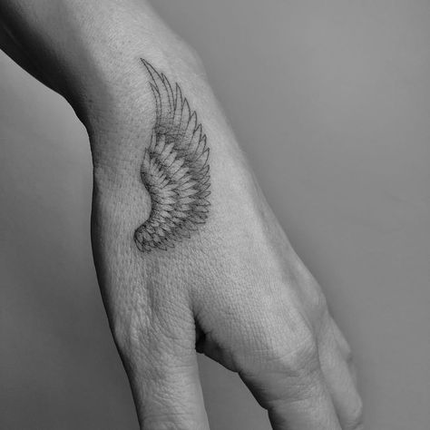 @winterstone on Instagram: “ANGEL WING #tattoo #angel #angelwing #tattooedgirls #girlswithtattoos #handtattoo” Wing Hand Tattoo, Angel Wing Tattoo, Hand Tattoo Images, Wing Tattoos, Tattoo Angel, Tattoos Hand, Small Wing, Palm Tattoos, Angel Wings Tattoo