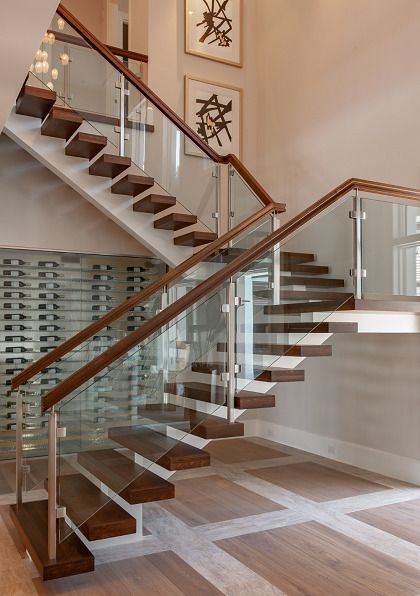 Stainless Steel And Glass Stair Railing, Glass Staircase Railing Stainless Steel, Staircase Design Glass Railings, Stainless Steel Staircase Design, Modern Stair Railing Stainless Steel, Glass Stairs Design Modern, Stairs Glass Railing Design, Railing Design Stairs, Stairs With Glass Railing