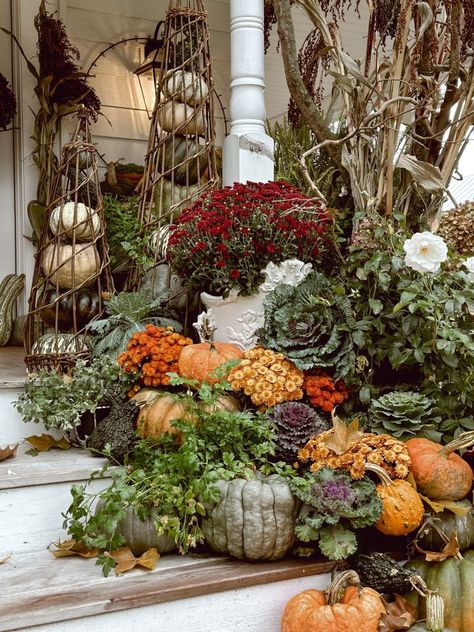 A Front Porch Straight Out of a Storybook: Embracing Autumn's Cozy Charm 22 Plants Stand, Fall Front Porch Ideas, Autumn Food, Fall Ball, Liz Marie, Pumpkin Display, Tablescape Inspiration, Vintage Garden Decor, Autumn Decorating