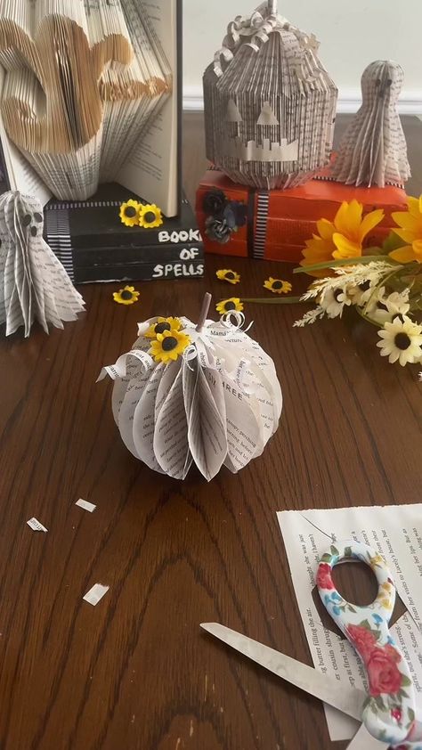 (6)How to make really easy book pumpkins to add to your little book ghost... | paper crafts | TikTok Book Page Ghosts, Diy Pumpkin Book, Book Related Crafts, How To Make Book Page Pumpkins, Book Page Pumpkin, Book Page Witch Diy, Crafts Tiktok, How To Make Honeycomb, Book Pumpkins