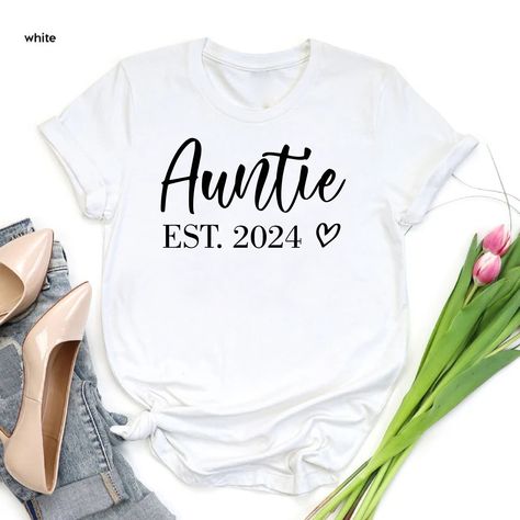 "Cute Auntie T-Shirt, Best Aunt Shirt, Auntie Est Shirt,Custom Auntie Gift Shirt,Aunt To Be Shirt,New Aunt Shirt, New Aunt Gift, Baby Announcement Shirt Aunt,Baby Reveal Gift Aunt ----- How To Order ----- 1-) Please, check and review all the photos. 2-) Choose your t-shirt size and color. *Different styles of shirts may have different shades of same color choice due to different manufacturer brands. *For this reason, we recommend you to match shirts from the same styles if you want precisely mat Auntie Baby Shirts, Favorite Auntie Shirts, Best Auntie Ever Shirt, Aunt Things, Auntie Established Shirt, Im The Aunt Shirt, Auntie Vibes, Aunt Baby, Aunt To Be