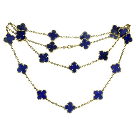 This gorgeous rare Van Cleef & Arpels 20-motif lucky clover necklace from the iconic Alhambra collection is crafted in 18k yellow gold and inlaid with blue lapis lazuli in round bead settings. Made in France circa 1980s. Measurements: 0.59" (15mm) width, 31.5" (80cm) length. Pre-owned. Shows some normal signs of wear. Comes with original pouch and VCA certificate of authenticity. Van Cleef Necklace, Navy Blue Jewelry, Alhambra Necklace, Navy Jewelry, Rare Vans, Van Cleef And Arpels Jewelry, Van Cleef & Arpels, Blue Vans, Van Cleef And Arpels