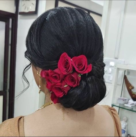 Adorable Artificial Flower Buns for Any Occasion Traditional Low Bun Hairstyles, Mexican Bun Hairstyles, Hair Bun With Red Roses, Side Rose Hairstyle Indian, Hairstyle For Mother Of The Bride Indian, Juda Hairstyle Buns Saree, Flower Bun Hairstyle, Indian Bun Hairstyles, Trendy Bun