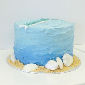 Blue ombre wave textured buttercream cake with edible sand and sea shells by Les Amis Bake Shoppe / Baton Rouge, LA Buttercream Sea Cake, Waves On Cake, Wave Cake Ideas, Ocean Birthday Cakes, Surf Cake, Edible Sand, Textured Buttercream, Wave Cake, Dory Birthday