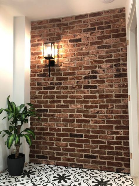 Brick slip wall with Paris tiles & wall light. Brick Slip Wall, Brick Shower Wall, Brown Brick Wall, Brick Walls, Indoor Brick Wall Ideas, Brick Tv Wall Ideas, Feature Brick Wall Lighting, Brick Wall Interior, Briks Painting Wall