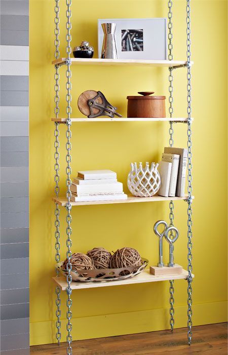 Industrial shelves add loads of cool factor to any room. Create this shelving unit with chain and basic boards for easy, affordable storage. Stairs Industrial, Office Stairs, Industrial Shelves, Kitchen Industrial, Affordable Storage, White Industrial, Industrial Space, Industrial Bar, Industrial Shelving