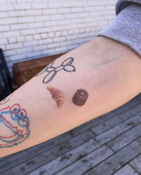 Crossaint Tattoo, Cereal Tattoo, Food Tattoo Ideas, Croissant Tattoo, Pastry Tattoo, Cookie Tattoo, Eat Tattoo, Unforgettable Tattoo, Cake Tattoo