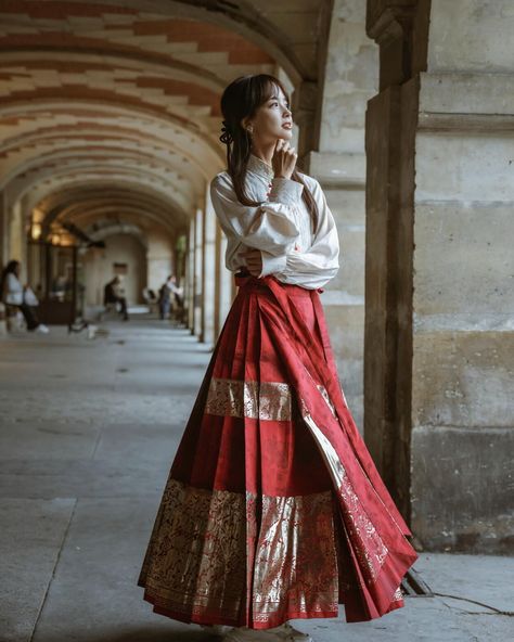 "Wang Bingbing, known as 'the sweetheart of CCTV,' appeared on the streets of Paris wearing a Chinese mamian skirt to cheer for the Olympics, showcasing the elegant and sophisticated Eastern civilization to the world." Shop on hangrace.com.au #TraditionalChineseClothing #CulturalHeritage #ChineseFashion #OlympicGames #Paris2024 #ParisOlympics #hanfu #Australia #chinesedress #chinesehanfu #chineseclothing #Chinesemamianqun #hanfufromchina #hanfuhairstyle #hanfugirls #hanfudress #hanfuphotogr... Mamian Skirt, Hanfu Hairstyles, Streets Of Paris, Hanfu Dress, Chinese Hanfu, The Olympics, Chinese Clothing, Paris Street, Chinese Dress