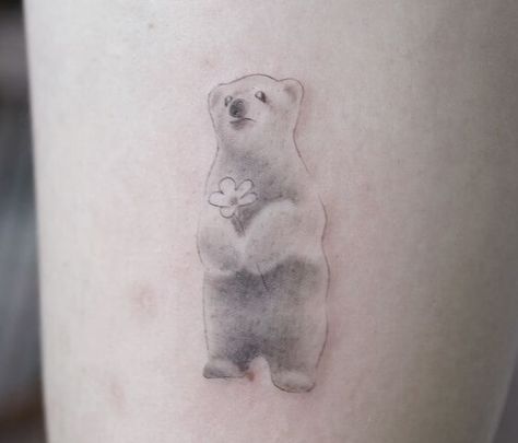 10+ Minimalist Bear Tattoo Ideas That Will Inspire You To Get Inked | PetPress Bear Holding Flowers Tattoo, Cute Bear Tattoo For Women, Honey Bear Tattoo, Little Bear Tattoo, Bear Cub Tattoo, Minimalist Bear Tattoo, Bear Tattoo Ideas For Women, Cute Bear Tattoo, Her Tattoo Ideas