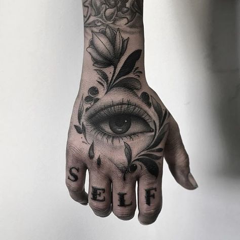 patterny eye hand 👁 love doing eyes! touched up the existing script on the knuckles too ✨ . . . . #tattoo #handtattoo #hand #eye #eyetattoo #blackandgrey #blackandgreytattoo #black #grey #pattern #patterntattoo #floral #floraltattoo #oxfordtattoo #oxford #oxfordtattooist #ukfemaletattooartists #oxfordartist 3rd Eye Tattoo, Hand Eye Tattoo, Third Eye Tattoos, All Seeing Eye Tattoo, Muster Tattoos, Geniale Tattoos, Hand Tattoos For Women, Hand Tattoos For Guys, Seeing Eye