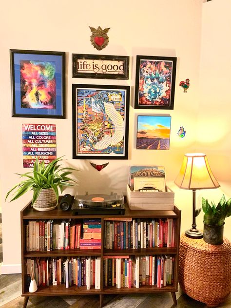 Book Filled Living Room, Living Room Music Decor, Hipster Living Room Decor, Living Room Book Storage, Boho Music Living Room, Band Poster Living Room, Small Living Room Bookshelf, Living Room Decor Books, Book Shelf In Living Room Idea