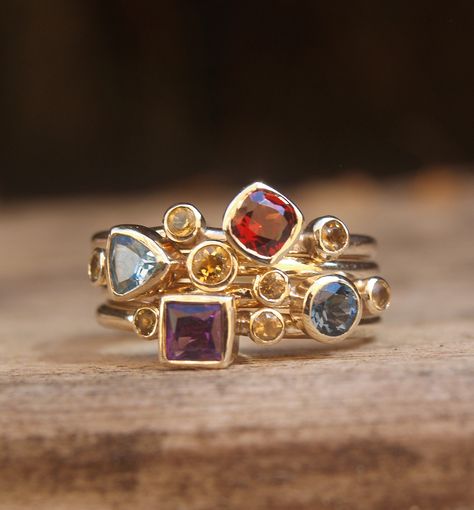 Multistone stacking set in recycled 9ct yellow gold. Multi Colour Gemstone Rings, Harlequin Engagement Ring, Colourful Gemstone Jewellery, Luxury Modern Multi-stone Gemstones, Luxury Multi-stone Yellow Gold Birthstone Ring, Nine Gems Ring, Stacking Gemstone Rings, 3 Gemstone Ring, Multiple Gemstone Rings