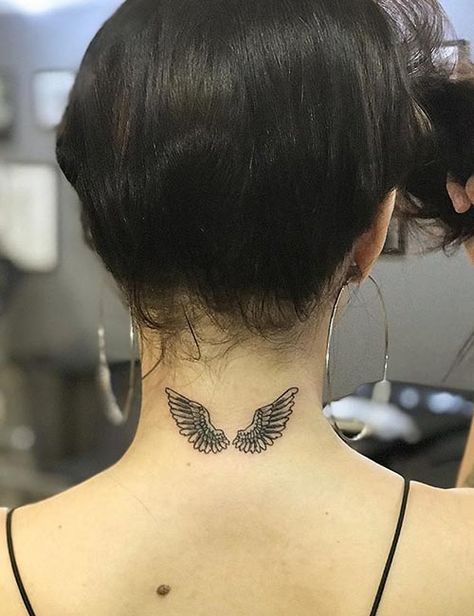 21 Angel Tattoo Designs That Will Inspire Your Next Tattoo Outing Behind The Neck Tattoos, Wing Neck Tattoo, Small Angel Tattoo, Angel Tattoo For Women, Wing Tattoos On Back, Alas Tattoo, Nape Tattoo, Wörter Tattoos, Band Tattoos