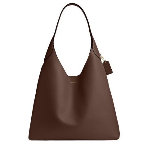 PRICES MAY VARY. Editor's Notes: Our Brooklyn is an elegant, minimalist silhouette—with a distinctly New York attitude. Larger than the 28, this larger hobo bag for women is crafted of natural grain leather with beautiful texture and soft feel Natural Grain Leather: A Natural Choice. Our semi-vegetable tanned Natural Grain Leather has a classic softly textured feel and unique character - for a perfectly classic Coach bag Spacious Interior: This generously sized womens shoulder bag features a spa Classic Leather Bags For Women, Brooklyn Shoulder Bag, Brooklyn Shoulder Bag 28, Brooklyn Coach Bag, Coach Brooklyn Shoulder Bag 39, Coach Brooklyn 28, Coach Brooklyn Shoulder Bag, Coach Brooklyn, Classic Leather Bag