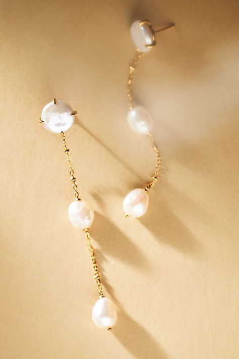 These elegant earrings by NADRI showcase three delicate pearls suspended along a dainty drop chain, effortlessly adding timeless sophistication to classic and contemporary bridal looks. | Dot Linear Pearl Drop Earrings by NADRI in Gold, Women's, Gold/Cubic Zirconia/Sterling Silver at Anthropologie Elegant Wedding Jewelry Brides, Hanging Pearl Earrings, Pearl Drop Earring, Wedding Jewelry Pearls, Pearl Dangle Earrings Wedding, Wedding Earrings Bride, Elegant Bridal Jewelry, Pearl Jewelry Earrings, Pearl Jewlery