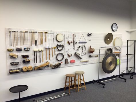 Pegboard as storage solution for auxiliary percussion equipment. Band Room Ideas, Music Room Storage, Band Classroom, Music Room Organization, Band Rooms, Guitar Storage, Band Room, Drum Room, Home Studio Ideas