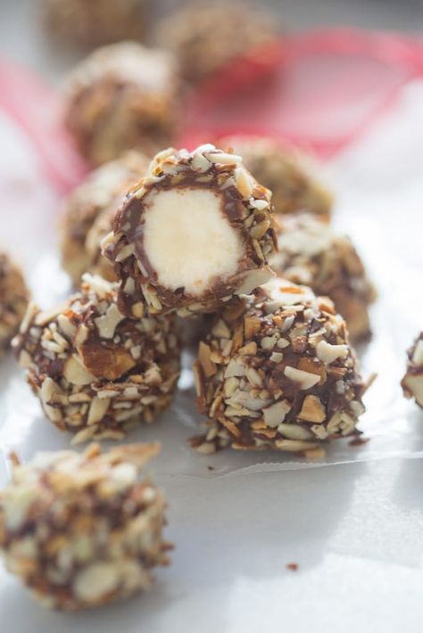 A stack of vanilla creme balls with a bite taken out of the one on top, revealing the vanilla creme filling. Bake Sweets, Tastes Better From Scratch, Candy Recipes Homemade, Easy Snack Recipes, Balls Recipe, Desserts Recipes, Toasted Almonds, Sweets Desserts, Candy Recipes