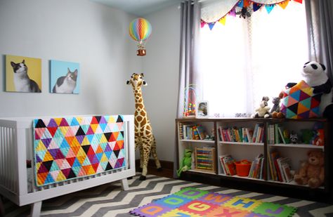 gender neutral nursery. This is how you do primary colors in a kid's room! Gender Neutral Rainbow Nursery, Newborn Room Colorful, Modern Colorful Nursery, Gender Neutral Colorful Nursery, Colorful Baby Boy Nursery, Bright Colorful Nursery Ideas, Bright Colors Nursery, Bright Color Nursery, Colorful Gender Neutral Nursery