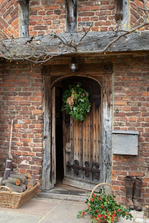 Tudor Christmas Decorations, Victorian Doors Front Entrance, English Country Fireplace, Updated Tudor Exterior, European Farmhouse Christmas, Tudor Headdress, English Tudor Homes Interior, Whimsical House Interior, Whimsical House Decor