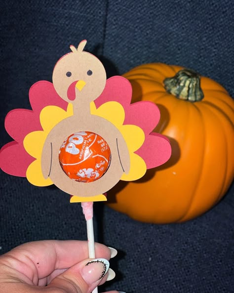 "GOBBLE GOBBLE 🦃 These cute Turkey themed lollipop holders make for a great addition to any goodie bag as a class gift !. They will also make great addition to the kids table at Thanksgiving  This listing is for ONE item.  There will be two options for purchase -  The first option will be listed as \" add pop & tag\" , this will include  - one assembled lollipop holder  - lollipop - personalized thanksgiving themed gift tag sticker There will also be another option - this one will be listed as Turkey Goodie Bags, Turkey Lollipop Craft, Thanksgiving Table Favours, Turkey Sucker Holder, Thanksgiving School Treats Prepackaged, Turkey Lollipop Holder, Thanksgiving Table Favor, Thanksgiving Lollipop Holder, Homemade Thanksgiving Gifts