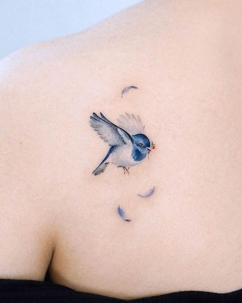 Phoenix Feather Tattoos, Feather Tattoo Colour, Feather Tattoo Meaning, Tiny Bird Tattoos, Bluebird Tattoo, Bird Tattoos For Women, Vogel Tattoo, Ribcage Tattoo, Handpoke Tattoo