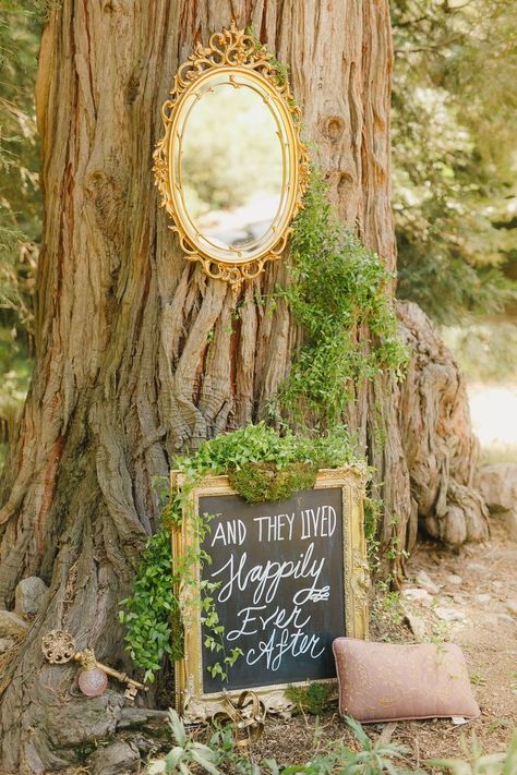 Disney fairytale wedding inspiration. "And they lived happily ever after" written on a gold ornate frame.  #fairytalewedding #happilyeverafter #weddinginspiration Fairy Wedding Theme, Enchanted Wedding Decor, Shrek Wedding, Princess Wedding Theme, Fairytale Wedding Theme, Forest Theme Wedding, Storybook Wedding, Enchanted Forest Wedding, Disney Fairy Tale Weddings