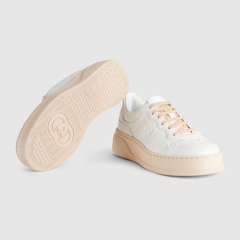 Shop the Women's GG embossed sneaker in white at GUCCI.COM. Enjoy Free Shipping and Complimentary Gift Wrapping. Gucci Luxury Sneakers With White Sole, Gucci White Sneakers With Textured Sole, Luxury Beige Gucci Sneakers, White Gucci Slip-on Sneakers, Gucci White Lace-up Sneakers, Luxury Birthday Gifts, Valentino Fashion, Luxury Birthday, Gucci Sneakers