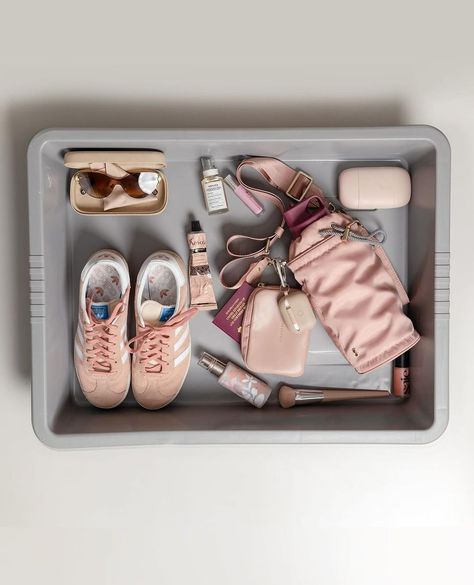 Influencers are doing photo shoots with their airport security trays in a new online trend that has people angry about holdups in the line. Here’s what it’s all about. Airport Tray, Tray Aesthetic, Things Organized Neatly, Summer Packing, Airport Security, Summer Aesthetic, Studio Photography, This Summer, Chloe