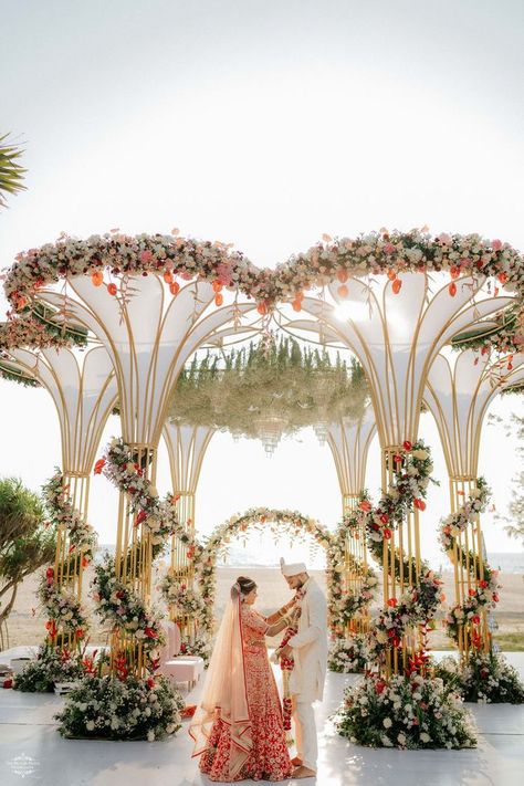 Goa Wedding With A Myriad Of Hues & Pretty, Personalised Decor! | WedMeGood Varmala Theme, Wedding Chori, Wedding Decor Mandap, White Mandap, Haldi Theme, Vidhi Mandap, Mandap Ideas, Mehendi Decoration, 2025 Design