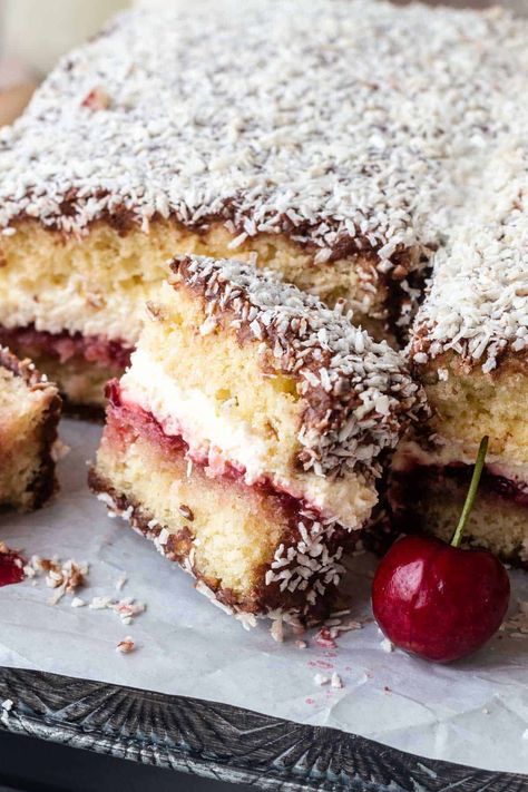 There's nothing more Australian that Lamingtons, sold at every school fair or afternoon tea. Squares of a moist butter sponge, coated in chocolate icing and rolled in desiccated coconut make for the perfect afternoon treat. Edmonds Cookbook Recipes New Zealand, Australian Dessert Recipes, Australian Lamingtons, Moist Butter Cake, Sweet Dessert Recipes, Australian Foods, Australian Cake, Australia Recipes, Cake Cravings