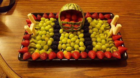 Football fruit tray Fruit Football Tray, Fruit Platter Football, Football Fruit Platter, Fruit Tray For Football Party, Sports Fruit Tray, Super Bowl Fruit Tray, Football Fruit Tray, Football Fruit Tray Ideas, Super Bowl Fruit