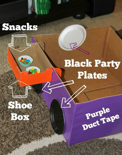 Make your own cardboard box car with some colored duct tape, black paper plates, a shoe box with attached lid, and some tape or brads. This easy DIY project takes less than 15 minutes to complete and is inexpensive fun for your kids! Diy Movie Night, Lila Party, Cardboard Box Car, Cardboard Car, Movie Birthday Party, Vintage Jeep, Movie Birthday, Diy Birthday Party, Cars Birthday Parties