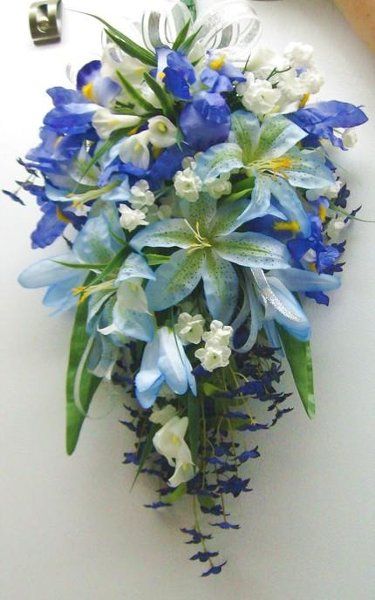 My Photo Album Wedding Flowers Photos on WeddingWire Blue Stargazer Lily, Stargazer Lily Wedding, Stargazer Lily Bouquet, Iris Wedding, Red Bridal Bouquet, Cascading Bridal Bouquets, Cascading Wedding Bouquets, Wedding Flower Packages, Blue Wedding Bouquet