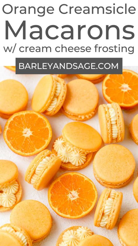 These orange creamsicle macarons have a light, orange flavored macaron shell filled with a vanilla cream cheese frosting. They taste just like a classic orange creamsicle but in macaron form! Orange And Blue Macarons, Orange Macarons Aesthetic, Spring Macarons Flavors, Orange Cream Dessert, Orange Macarons Recipe, Fruity Macaron Flavors, Macarons Fillings Recipe, Simple Macaroons Recipe, Orange Creamsicle Macaron