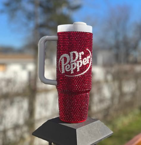 This listing is for a 30 oz or 40 oz full bling Dr Pepper style Stanley Quencher. Tumbler base is covered in red/siam glass rhinestones. Perfect gift for mom, wife, daughter, girlfriend,  friend and/or yourself.   Tumbler comes with matching plastic lid and reusable straw. Tumbler is not dishwasher safe. Handwash only. Avoid leaving in extreme heat. Do NOT drop. Dr Pepper Stanley, Red Stanley, Starbucks Cup Design, School Dr, Rhinestone Cups, Rhinestone Projects, Straw Tumbler, Pinterest Diy Crafts, Stanley Quencher