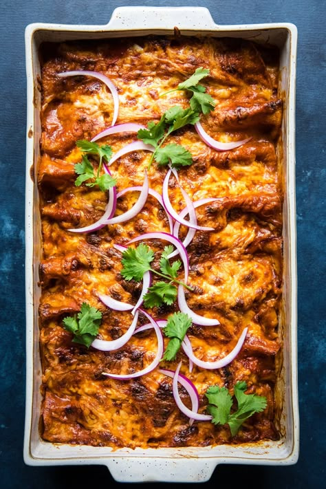 Our Tex-Mex style, easy chicken enchiladas with red sauce are baked under a blanket of cheese and loaded with shredded chicken. Plus, with only six ingredients, they’re a total no-brainer. Chicken Enchiladas With Red Sauce, Shredded Chicken Recipes Easy, Enchiladas With Red Sauce, Red Chicken Enchiladas, Easy Chicken Enchiladas, Easy Chicken Enchilada Recipe, Cheesy Chicken Enchiladas, The Modern Proper, Red Enchiladas