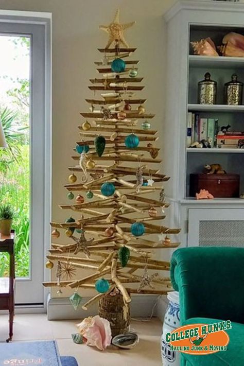 The holiday season is upon us, and nothing fills a home with festive spirit like a beautifully decorated Christmas tree. We’ve compiled a list of trees that are sure to make your holiday stress-free, whether you’re decorating a real or an artificial tree. Check out these six Christmas tree ideas that are sure to bring a smile to everyone’s face. Eco Christmas Tree, Driftwood Display, Eco Friendly Christmas Decorations, Wooden Xmas Trees, Unusual Christmas Trees, Recycled Christmas Tree, Wood Lights, Driftwood Christmas, 6ft Christmas Tree