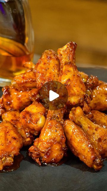 Cole Roberson “ThatSavageKitchen” on Instagram: "Hot Honey Bourbon Wings
(How was your 2023?)
Ingredients - 
400 F 35-40 Minutes
3 Lbs Wings 
1/2 Cup Bourbon Whiskey (Marinate for at least 30 minutes)
——
Seasoning - 
1 Tbsp Baking Powder
1 Tbsp Cornstarch 
1 Tsp Black Pepper
1 Tsp Red Chili Flakes
1 1/2 Tsp Onion Powder
1 1/2 Tsp Garlic Powder
1 1/2 Tsp Paprika
1 1/1 Tsp Salt
———
Sauce
4 Tbsp Butter
5 Tbsp Hot Sauce
4 Cloves Garlic (Minced)
1 Cup Bourbon
1/3 Cup Honey
1/4 Cup Brown Sugar
Pinch Onion Powder
Pinch Garlic Powder
Pinch Red Chili Flakes
——————
#chicken #thatsavagekitchen •
#reelsinsta #foodie #food #foodporn #foodblogger #foodstagram #foodies #foodlover #foodgasm #chickenwings #chickenrecipes #wings #wingsoffire #wingstop #chickenrecipe #gamedayfood #appetizers #newyears" Bourbon Wings, Hot Wing Recipe, Garlic Wings, High Tea Food, Honey Bourbon, Hot Honey, Red Chili Flakes, Jamaican Recipes, Chili Flakes