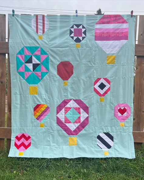 ✨ Up, up, and away with this dreamy balloon quilt! 🎈 I’m absolutely in love with how Jesse from @imperfectquilting combined #AGFPureSolids, prints from @pattybasemi’s Tails and Threads collection, and @maureencracknell’s Woodland Keeper collection to create the sweetest balloons. 🌿 The subtle, soft backdrop of AGF Pure Solids in Morning Frost makes each fabric choice pop beautifully! 💫 Check out more of Jesse’s inspiring work over on her Instagram and prepare to be amazed! 🌟 Sky Quilt Pattern, Balloon Quilt, Morning Frost, Sky Quilt, The Enchantments, Family Traditions, The Balloon, Quilt Pattern, Hot Air Balloon