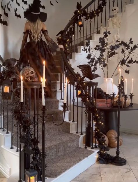 Transform your home into a haunted haven with over 80 creative and creepy Halloween decoration ideas. From eerie lighting to spooky DIY crafts, we've got you covered! #HalloweenDecor #IndoorDecor #SpookySeason #halloween #halloweendecoration #halloweenhomedecor #falldecor #tjmaxxfinds Halloween Decorated Staircase, Halloween Witches House Decorations, Halloween Archway Indoor, Halloween Party Ambiance, Halloween Banister Ideas, Witchy Backdrop Ideas, Halloween Stairs Decor, Staircase Halloween Decor, Halloween Entryway Decor Indoor