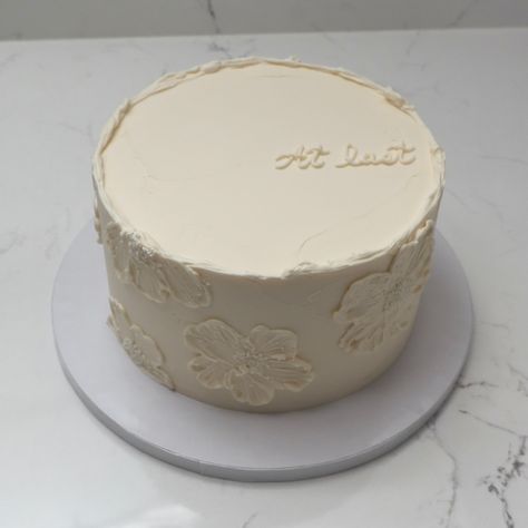 At last 💍 - Cake Details - Size: Standard 7” (two layers) #emmacakes #emmacakesseattle #seattle #seattlecakes #customcakes #wedding #weddingcakes #vintagewedding Wedding Cake Ideas One Tier, Wedding Cake Writing, Wedding Cake Single Layer, Minimalist Wedding Cake One Tier, Simple Wedding Cake Small One Tier, One Layer Wedding Cake, Simple Two Tier Wedding Cake, Elopement Cakes, Minimalistic Wedding Cake