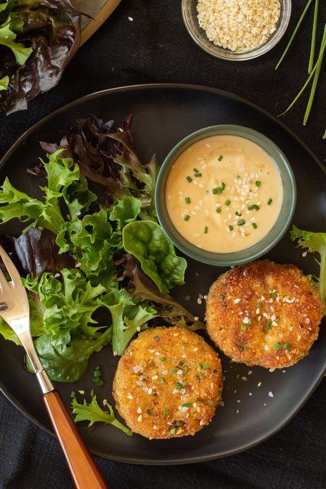 a black plate with two crab cakes, a small dish of remoulade, and assorted salad greens Crab Cake Sides, Asian Crab Cakes, Crab Cake Recipe Easy, Crab Cake Appetizer, Crab Cake Recipes, Crab Cake Recipe, Crab Cake, White Miso, Delicious Appetizer Recipes