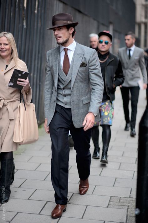 Looks of a metro-mafia guy with brown classic effect, that makes everyone stand down. Classy grey 3 piece suit with brown formal wing-tip shoes. Winner's fine elegant choice for Valentine's Day..!! Grey 3 Piece Suit, Brown Fedora, A Man In A Suit, Mens Fashion Dressy, Man In A Suit, Formal Fashion, Hipster Mens Fashion, David Gandy, Sharp Dressed Man