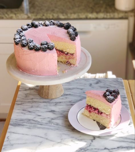 This Lavender Blackberry Cake is delicate and sweet with just a hint of aromatic lavender. The blackberry syrup turns the frosting into a pretty pastel Lilac Cake, Blackberry Cake, Blackberry Syrup, Lavender Syrup, Cocktail Syrups, Cake Mixture, Creamed Eggs, Pretty Pastel, Flower Cake