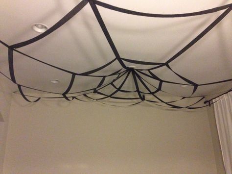 Spiderweb streamers for Finn's superhero party. Spider Web With Streamers, Streamer Spider Web, Coraline Decorations Party Ideas, Halloween Work Party, Spooky Anime, Halloween Sleepover, Gazebo Decorations, Spooky Home Decor, Party Streamers