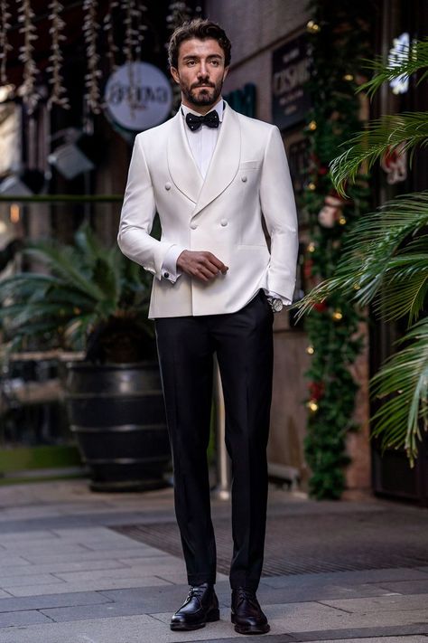 Flaunt your luxurious charm with the White Slim-Fit Tuxedo 3-Piece. The elegant white color and meticulously tailored fit offer a look of pure sophistication and class. Perfect for grand events and special occasions, this tuxedo guarantees you’ll make a stunning impression, exuding confidence and style.  #doublebreasted #whitetuxedo #tuxedo #suit #suits #slimfit #menstyle #menfashion #fashioninspo Classy Wedding Suits For Men, Formal Tuxedo For Men, White Tuxedo For Men, Tuxedo For Men Wedding Classy, 1920s Tuxedo, Fat Men Outfit, White Tuxedo Men, Mens Suits Style Modern Classy, White Blazer Suit