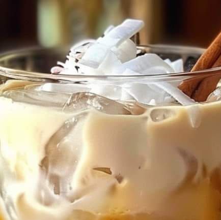 Pamela Marcum on Instagram: "Coconut Rum White Russian 🥥🍹

Ingredients:
- 1.75 oz coconut rum
- 0.75 oz coffee liqueur (e.g., Kahlúa)
- 1 oz coconut milk
- Ice

Instructions:

1. Fill Glass with Ice:
 - Fill a rocks glass with ice cubes.

2. Add Coffee Liqueur:
 - Pour the coffee liqueur over the ice.

3. Add Coconut Rum:
 - Pour the coconut rum into the glass.

4. Top with Coconut Milk:
 - Slowly pour the coconut milk over the mixture to create a layered effect.

5. Stir and Serve:
 - Gently stir to combine the ingredients.

6. Garnish:
 - Optionally, garnish with a sprinkle of cocoa powder or a toasted coconut rim.

Tips:
- For a creamier version, use coconut cream instead of coconut milk.
- Serve with a cinnamon stick for added aroma and flavor.

Enjoy your delicious Coconut Rum White Coffee Liqueur, White Russian, Coconut Rum, Toasted Coconut, Ice Cubes, Coconut Cream, The Ice, The Coffee, Liqueur